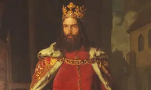 Portret króla z koroną na głowie i brodą, ubranego w czerwony strój i futrzany płaszcz. Ten dumny książę spogląda wprost na widza.