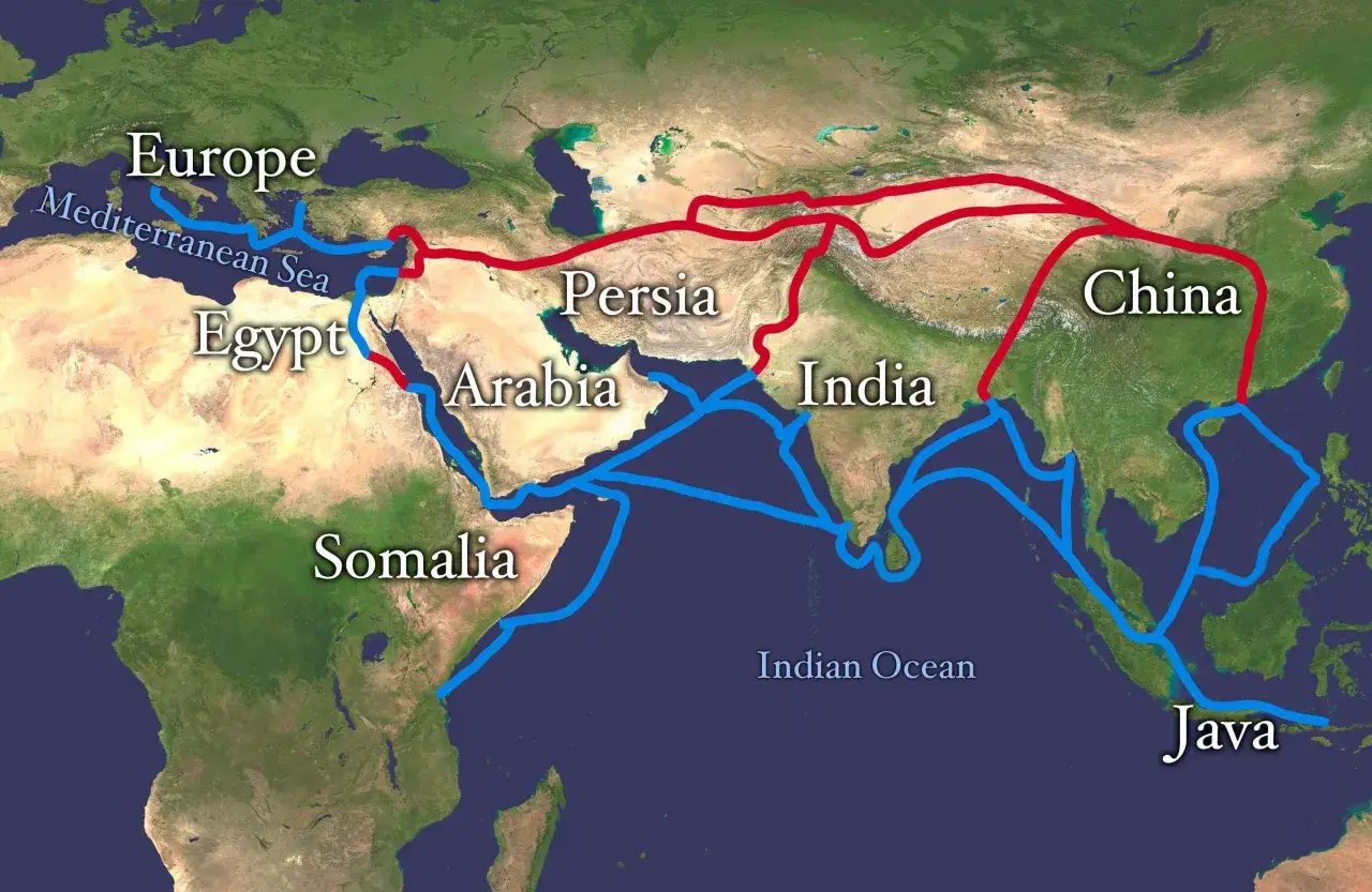 Mapa przedstawia historyczne szlaki handlowe, w tym lądowy i morski jedwabny szlak, łączący Europę, Egipt, Arabię, Persję, Indie, Chiny i Jawę.