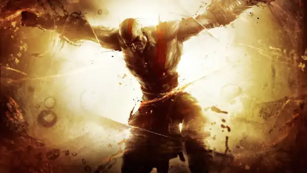 Kratos, gniewny **titan**, rozrywa więzy, otoczony złotym blaskiem i pyłem.