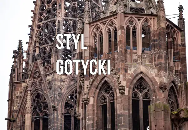 Kamienna katedra z licznymi zdobieniami, ostrymi łukami i rozetami. Widoczne są charakterystyczne cechy stylu gotyckiego: strzelistość, bogactwo detali architektonicznych i kamienne gargulce.